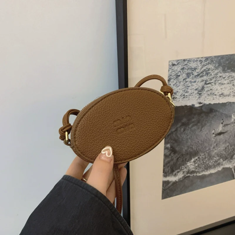 Mini Oval Crossbody Bag