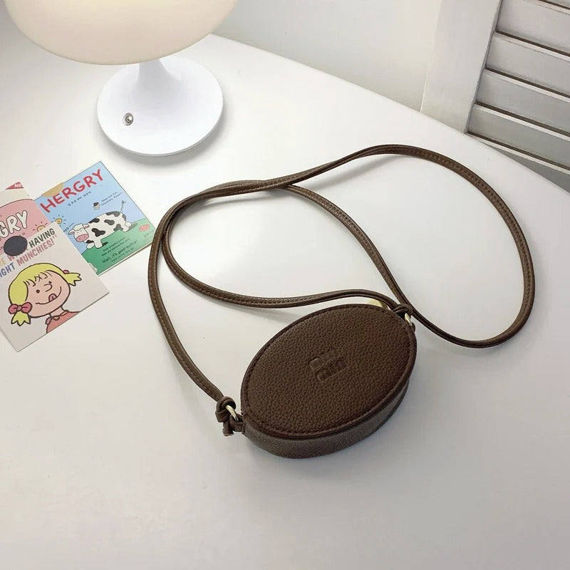 Mini Oval Crossbody Bag